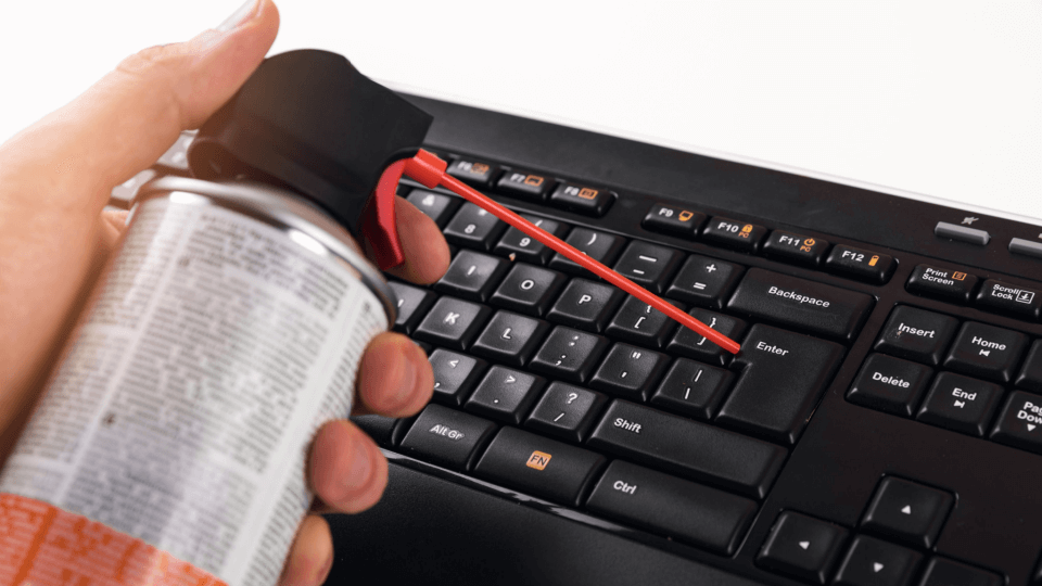  cleaning keyboard with compressed gas
