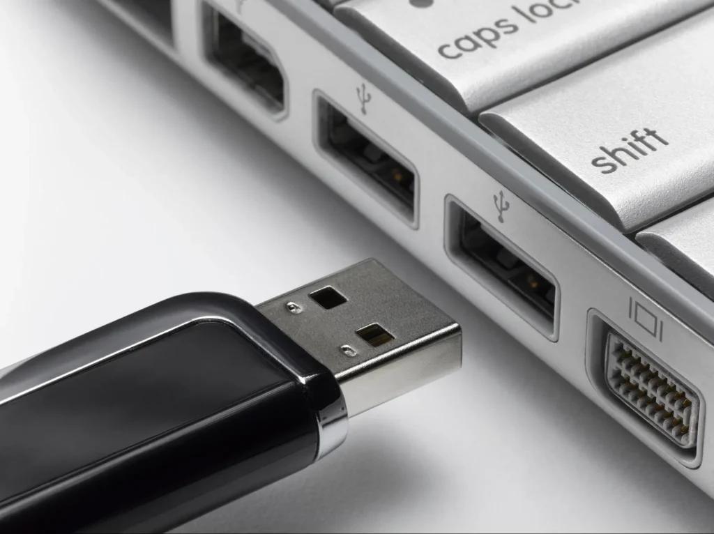 clean usb port with tweezers