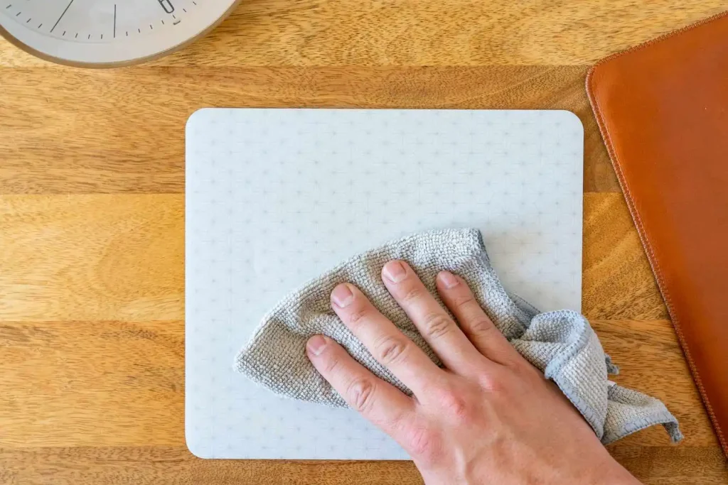 clean mouse pad at home with a cloth