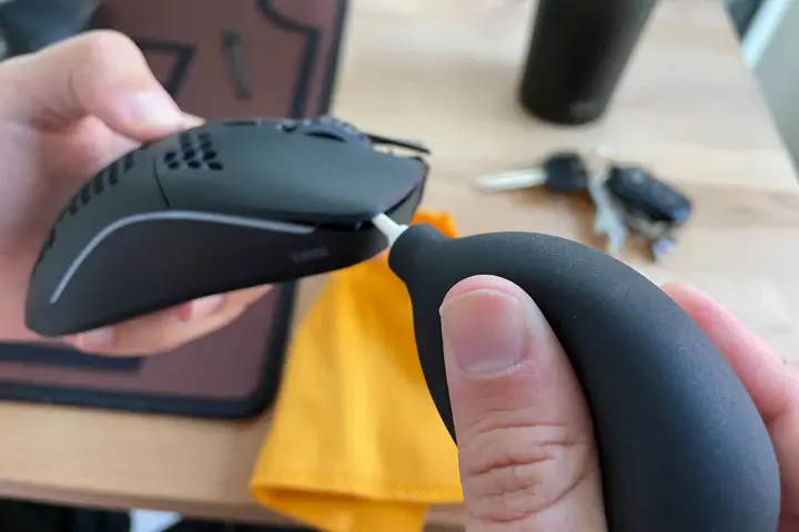clean mouse with compressed air carefully