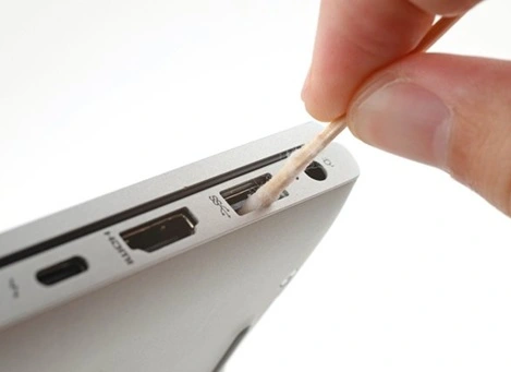 clean the audio port of laptop